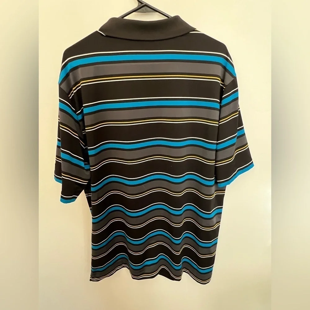 NIKE GOLF DRI-FIT SIZE LARGE MEN’S GOLF SHIRT. MULTI COLORED